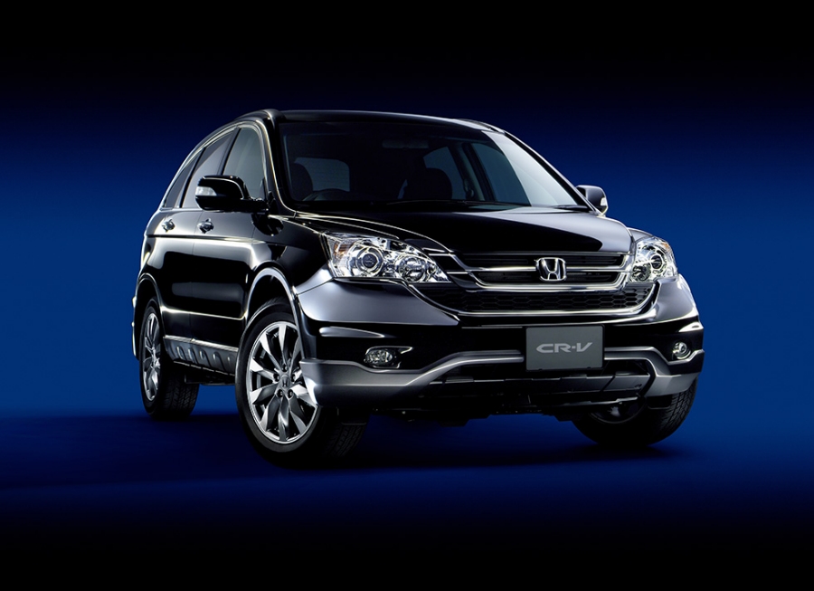 a black honda cr-v, inside a dark-blue and black background